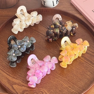 Five-piece set of floral acetate hair claws with rhinestones and elegant marble patterns