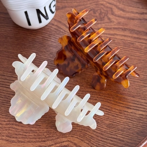 3D puppy acetate hair claw clips in amber tortoiseshell and pearlescent white set