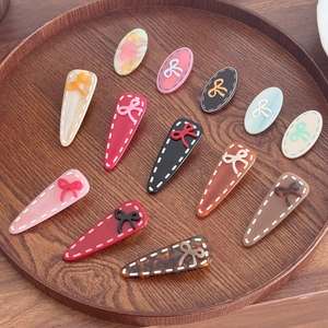 Französischer Stil Acetat Haarklammer Süße Schleife Entenschnabel Haarnadel Für Damen Elegant Genäht Minimalistischer Seitenclip Haarschmuck
