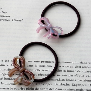 Elegant bow hair ties with marble and tortoiseshell patterns on high elastic bands