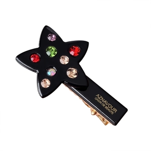 Elegant star-shaped acetate hair clip with colorful rhinestones on a white background
