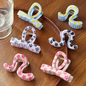 Cute printed claw clips with paw patterns in butterfly and wavy shapes for hair