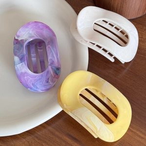 Ink marble flat hair claw clips in purple, white and yellow colors for hair styling