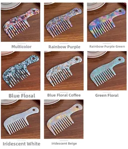 Detail of diverse acetate hair combs showing marble, floral patterns, and vibrant colors