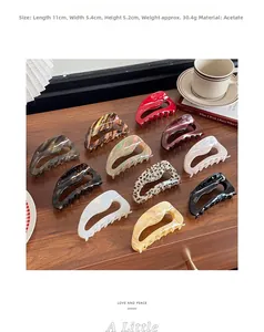 Close-up of 10 assorted acetate hair claws with 11cm dimensions and French retro style