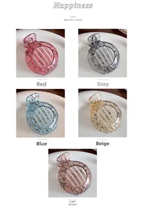 Ink pattern hair claws in five colors: red, grey, blue, beige, and light brown