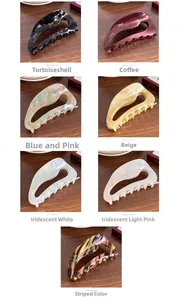 Close-up of seven assorted acetate claw clips in tortoiseshell and marble patterns