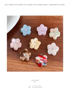 Detailed overhead view of 8 colorful acetate flower hair clips with small rhinestones