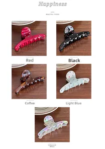 Detailed view of hair clips showing colorful rhinestones on various acetate finishes
