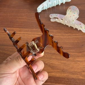 Elegant amber tortoiseshell acetate shark hair claw clip with colorful rhinestones