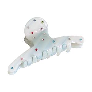 Elegant marble blue acetate hair claw clip with colorful rhinestones on white background