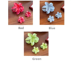 Three-piece marble texture frangipani hair claw set in red, blue, and green variants