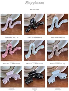 Detail of colorful resin hair claws with heart and bow patterns on a wooden table