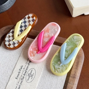 Cute flip-flop shaped acetate hair clips in checkered brown and marble pink patterns