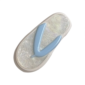 Cute flip-flop shaped hair clip made of blue acetate and pearlescent white resin
