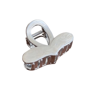 Sleek silver metal butterfly claw clip with hollow geometric design for women hair