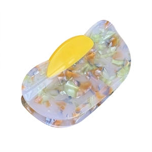 Elegant multi-color acetate hair claw clip with colorful marble pattern and yellow handle