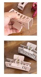 Close-up of flexible silicone shark hair claw with matte finish and strong metal spring