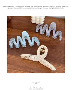 Detail showing wave and shark hair clips in translucent jelly colors with dimensions