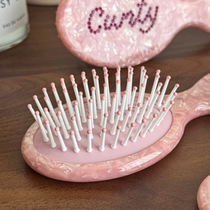 Pink marble texture hair brush with rhinestones and soft massage bristles for daily styling