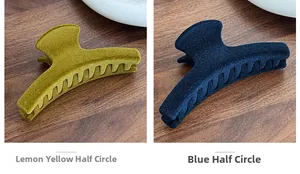 Detail of yellow and blue flocked shark hair clips with velvet texture and strong grip teeth