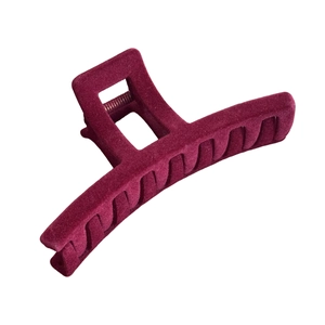 Elegant large burgundy flocked hair claw clip with matte velvet texture for women