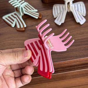 Pink striped butterfly hair claw clip made of acetate board for elegant hair styling