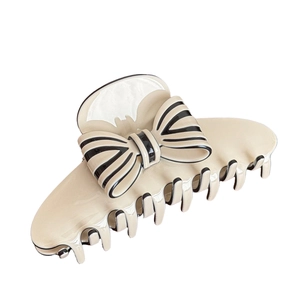 French vintage cream hair claw clip with black and white striped bow hair accessory