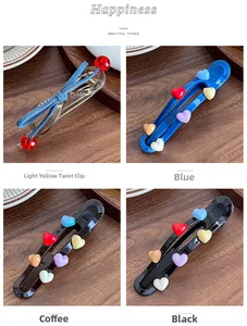 Detailed grid showing acrylic hair clips with colorful heart motifs and denim bow accents