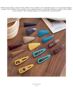 Detail of colorful acetate geometric hair clips in water drop and triangle shapes