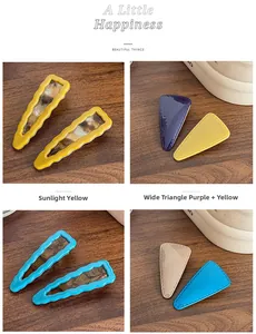 Close-up of stylish resin hair clips with retro tortoiseshell patterns and wavy designs