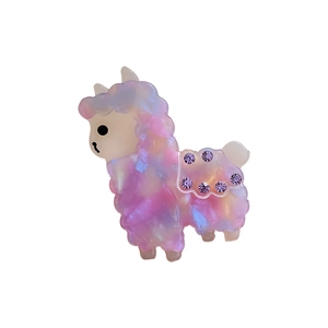 Iriskaderende alpaca haaraccessoire van acetaat met paarse fonkelende strasssteentjes