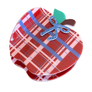 Vintage red and white plaid apple hair clip with a blue bow and green leaf detail