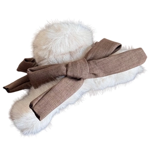 Elegant white plush shark hair claw clip with brown fabric bow accessory for women
