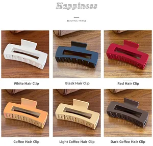 Macro shot of flexible matte silicone hair claw clips in various neutral color options