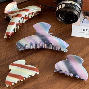 Elegant 4-piece acetate hair claw set with vintage stripes and gradient marbling