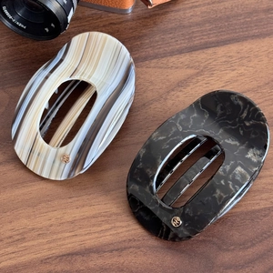 French vintage acetate hair clips set in marble pattern and brown tortoiseshell finish
