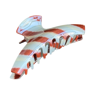 Large tortoiseshell pattern hair claw clip with striped marble texture for long hair