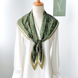 Elegant dark green floral silk triangle scarf on model with white shirt decoration
