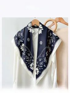 Detail showing high-quality faux velvet fabric with navy blue daisy floral print