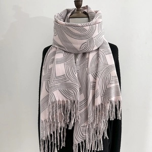 Women's warm cashmere-like scarf with pink grey geometric pattern and tassel edges