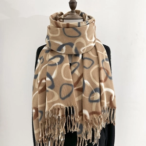 Thick warm cashmere-like shawl scarf with abstract circle patterns and tassel details