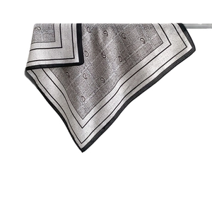 Silk-textured silver paisley pattern scarf with black border for stylish neck decoration