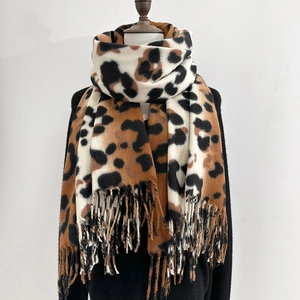 Elegant leopard print scarf with cashmere feel and tassels, stylish winter neck warmer