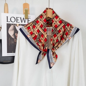 Detailed pattern of geometric silk scarf with lucky text paired on white shirt