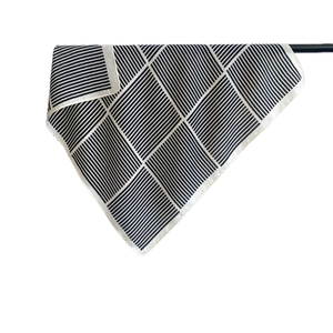 Minimalist black and white geometric silk scarf with striped pattern and fine hem details