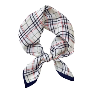 Classic cotton linen plaid square scarf with navy blue edges and knotted styling
