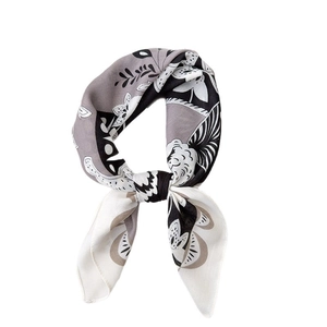 Elegant black and white botanical print square silk scarf with a glossy satin finish