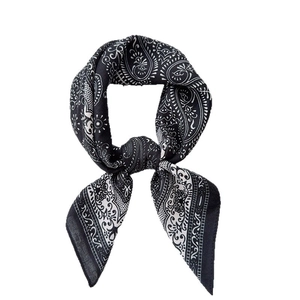 Vintage black and white paisley silk scarf with artistic paisley print in a loop knot