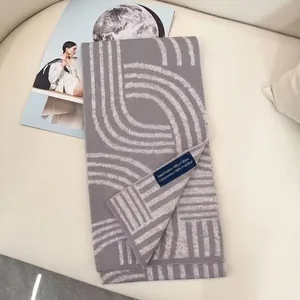 Thick grey sheep wool scarf with geometric patterns 180x30cm for winter warmth
